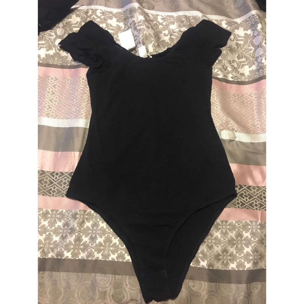 Snap between the legs body suit  , brand new